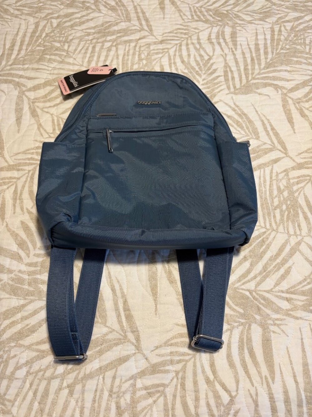 Baggallini Modern Blue Convertible Backpack With Multiple Pockets And Adjustable